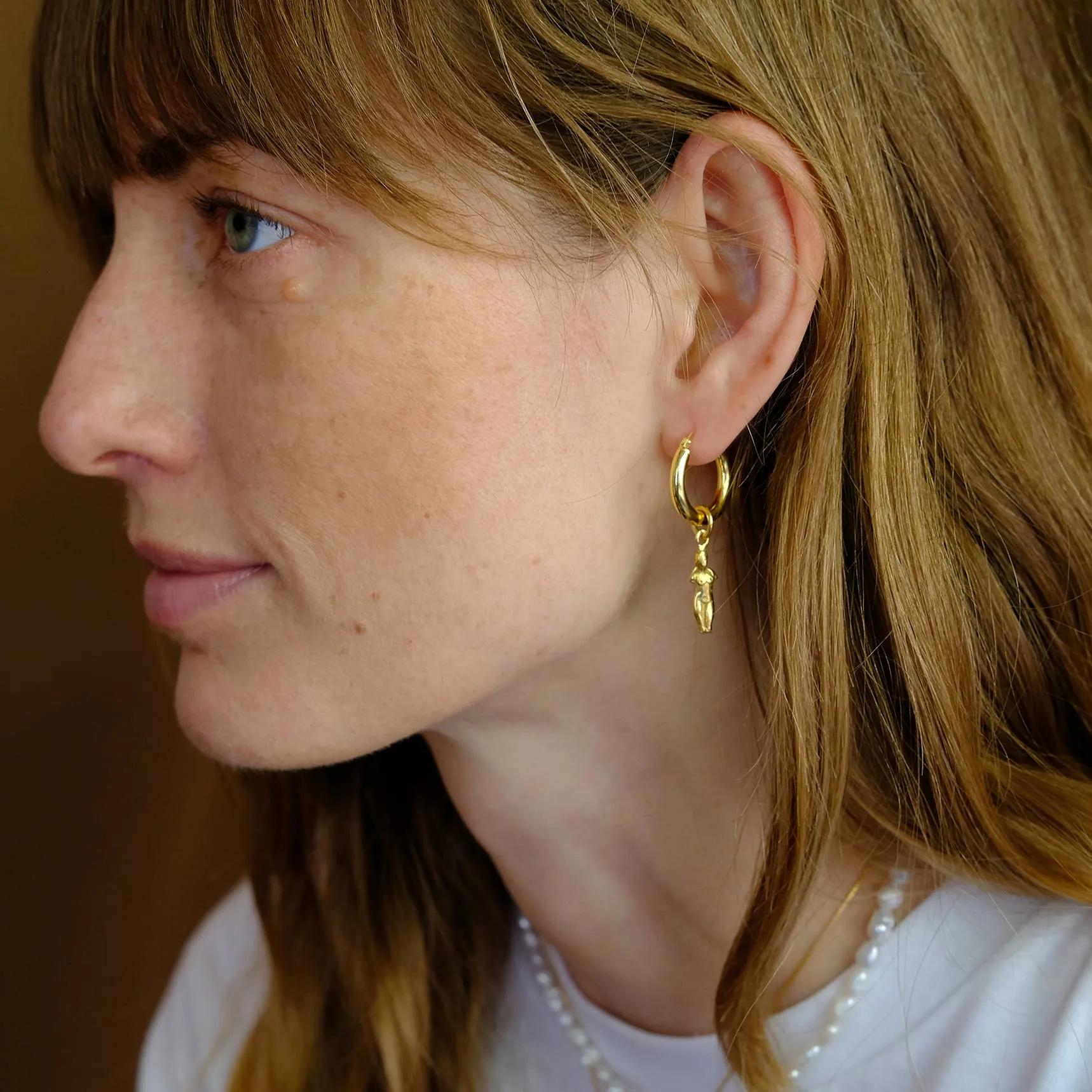 Chunky Hoop Earrings with Aphrodite and Fertility Pendant - Gold-Plated Silver